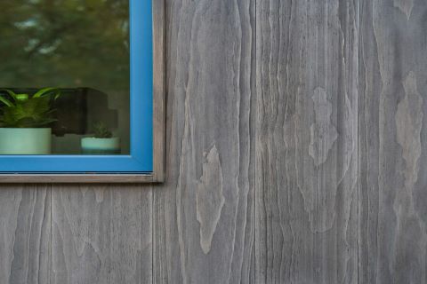Accoya gevelbekleding met grijze olie