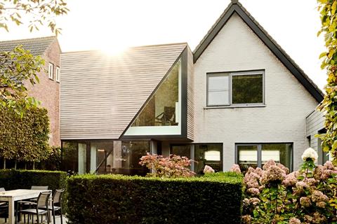 Optopping in houtskeletbouw met houten gevelbekleding