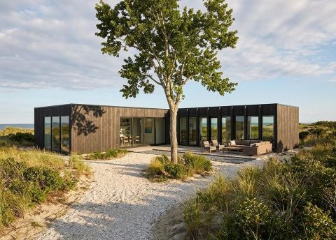 Houten woning aan zee met Carpentier DNA Houten woning aan zee met Carpentier DNA