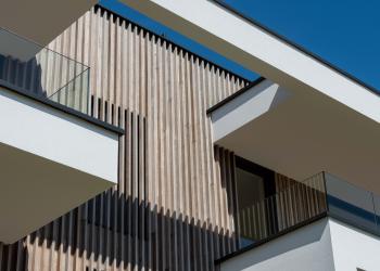 Thermisch essen gevelbekleding appartementsgebouw Wolvertem