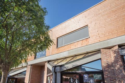 Houten gevelbekleding school Eke