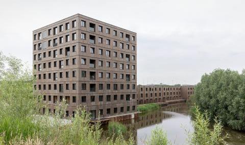 Biobased woningbouwproject Switi in Amsterdam met gevel in thermisch bamboe
