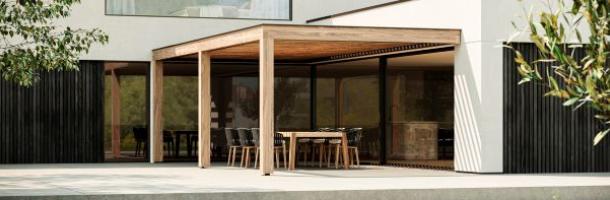 Houten overkapping met lamellendak aan huis gebouwd