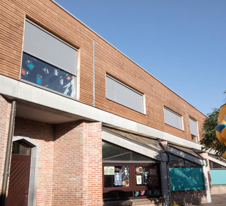 Houten gevelbekleding school Eke