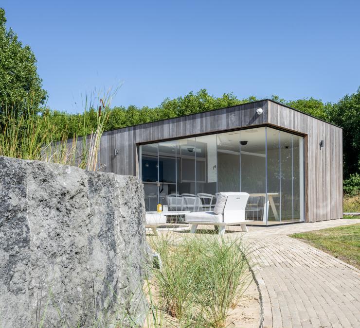 Modern pool house in the dunes