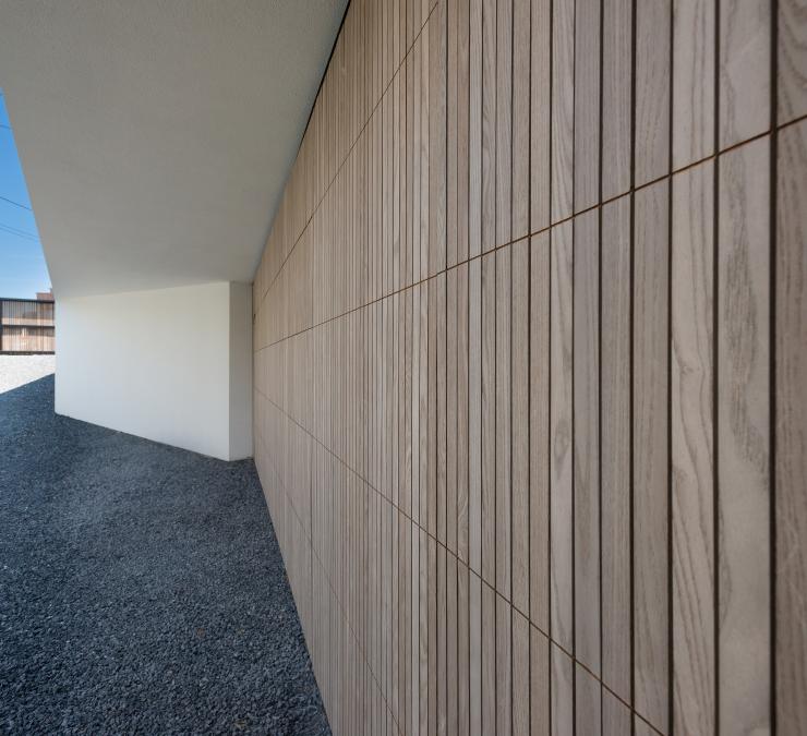 Sectional garage door in pre-weathered thermo ash