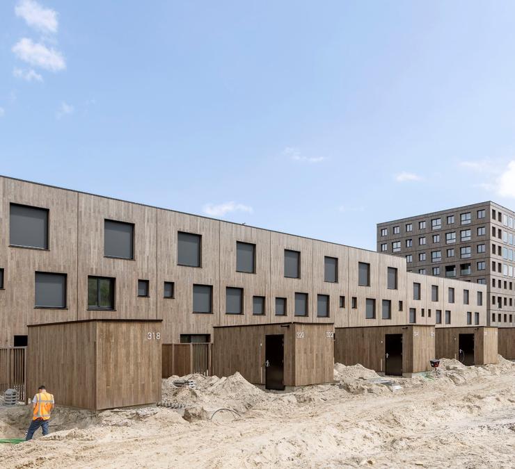 Housing project (under construction) with fire resistant bamboo cladding