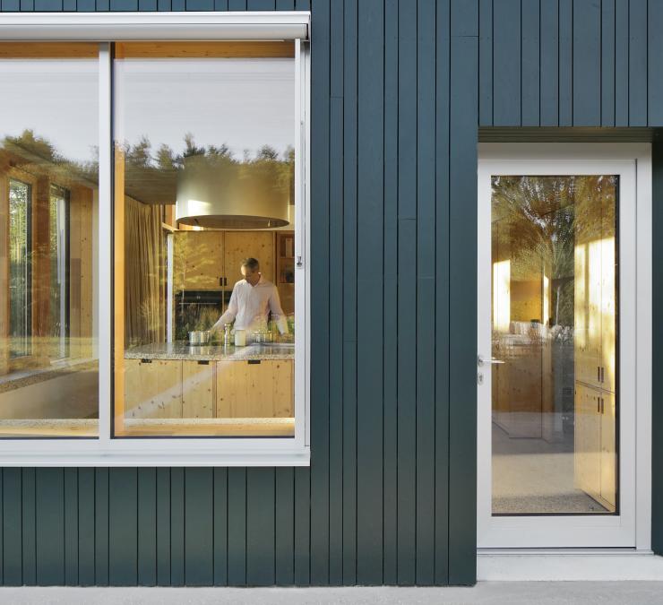 Passive house with timber cladding in an on-trend Emerald colour