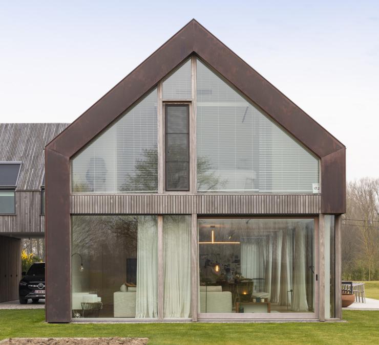 Attractive combination of glass, weathering steel and timber on the side façade